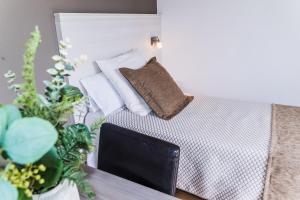 Posteľ alebo postele v izbe v ubytovaní Hotel Planas