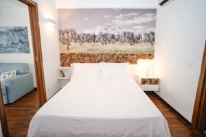 Postel nebo postele na pokoji v ubytování Welcome Ostuni b&b