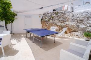 Stolní tenis v ubytování Welcome Ostuni b&b nebo okolí
