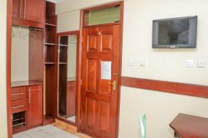 TV a/nebo společenská místnost v ubytování KAP Guest House