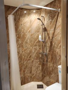 Koupelna v ubytování Viktoria Apartament + 3 fotografie