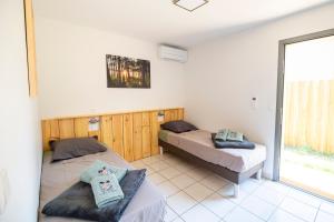 Postel nebo postele na pokoji v ubytování un Air de Repos