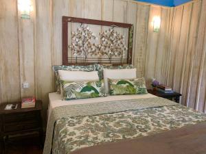 Säng eller sängar i ett rum på Hotel Fazenda Bom Retiro