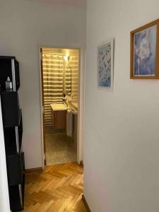 a room with a bathroom with a sink and a mirror at Live & Work Apart in Buenos Aires city, near park! in Buenos Aires +7 photos