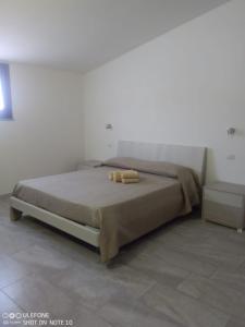 Appartamento A di Vico Martiri tesisinde bir odada yatak veya yataklar