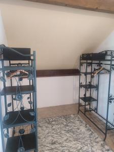 a room with two racks of wine glasses at Õ 2040 in Saint-Véran