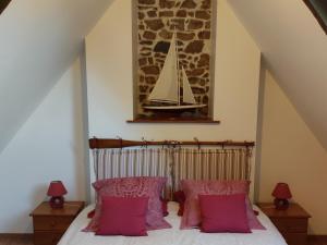 Postel nebo postele na pokoji v ubytování Gîte Les 3 Voiles