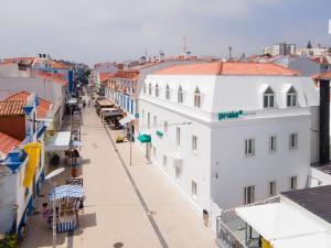an overhead view of a city street with buildings at Praia FLH Hotels Ericeira in Ericeira