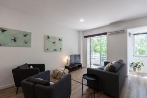 Posezení v ubytování FLH Penha França Art Apartment