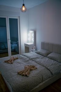 Postel nebo postele na pokoji v ubytování LAGATOR LUX