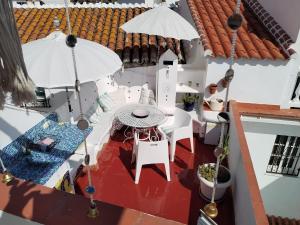 Balkón alebo terasa v ubytovaní Small village house with beautiful sea views