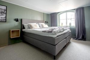 Hotel Montagne tesisinde bir odada yatak veya yataklar