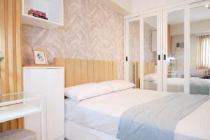 Postel nebo postele na pokoji v ubytování Hotel Vibe in Manhattan Plaza, Araneta City, Cubao