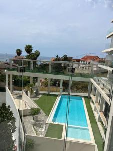 an aerial view of a building with a swimming pool at Calpe Beach in Calpe