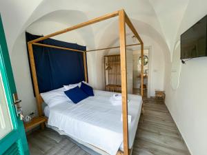 Postel nebo postele na pokoji v ubytování B&B Borgo Monacizzo