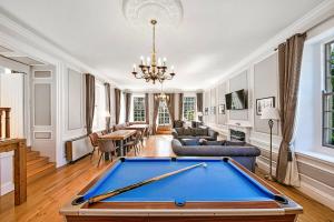 a living room with a pool table at Finest Retreats - Pennine Hall Apt in Thirsk