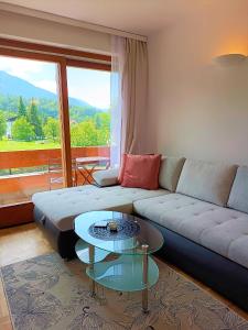 Posezení v ubytování Olympia Apartment