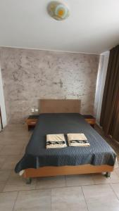 Ένα ή περισσότερα κρεβάτια σε δωμάτιο στο Casa Razvan Vama Veche