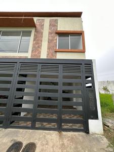 a garage door in front of a house at Apto-Parking cerca CC Gran Plaza in Pitalito