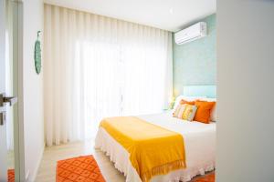Katil atau katil-katil dalam bilik di Iris Apartment