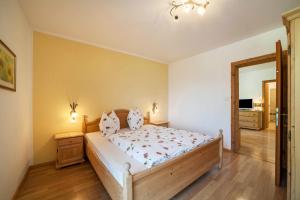Postel nebo postele na pokoji v ubytování Langstein Wohnung Sonnenblume