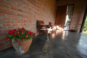 Istumisnurk majutusasutuses BaanSuk Sukhothai Resort