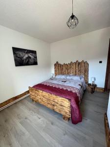 Ένα ή περισσότερα κρεβάτια σε δωμάτιο στο Gîte des douze mulets