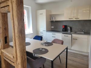 Kuchyň nebo kuchyňský kout v ubytování City-Apartments direkt am See - SEEBLICK!
