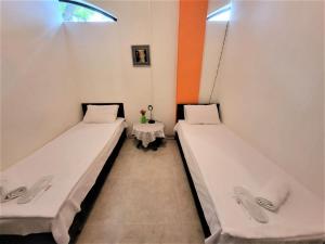 Letto o letti in una camera di Hostel Near The Square