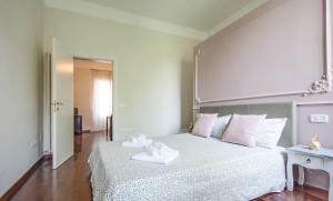 Postel nebo postele na pokoji v ubytování Bramante 21 + 5 fotografií