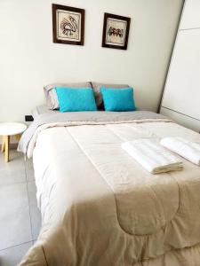 Giường trong phòng chung tại General Paz Apart- Mapa 04- Reina Fabiola +7 ảnh