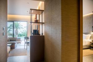 Posteľ alebo postele v izbe v ubytovaní KING MINOS RETREAT Resort & Spa