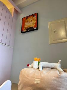 TV a/nebo společenská místnost v ubytování Flying Orange Homestay