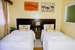 Letto o letti in una camera di DB Space
