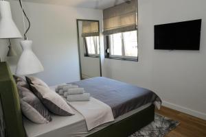 Katil atau katil-katil dalam bilik di Apartment Black