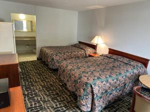 Postel nebo postele na pokoji v ubytování Newnan Nook + 5 fotografií