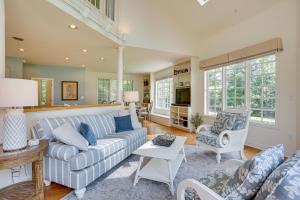 a living room with a couch and two chairs at Virginia Retreat on Wicomico River with Dock! in Reedville