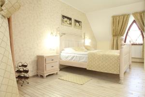 Posteľ alebo postele v izbe v ubytovaní Publo Spa Hotel