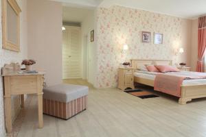 Posteľ alebo postele v izbe v ubytovaní Publo Spa Hotel + 34 fotografií