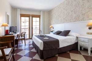 Postel nebo postele na pokoji v ubytování Hotel Avenida Tropical by Bossh! Hotels