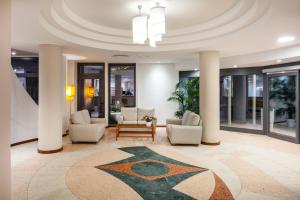 Posezení v ubytování Hotel Carlo Felice Sassari