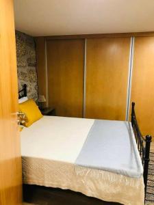 Ένα ή περισσότερα κρεβάτια σε δωμάτιο στο Casa da Cancela