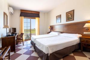 Postel nebo postele na pokoji v ubytování Hotel Avenida Tropical by Bossh! Hotels