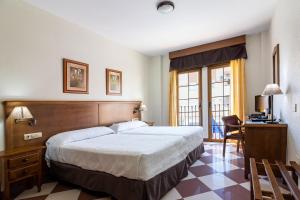 Postel nebo postele na pokoji v ubytování Hotel Avenida Tropical by Bossh! Hotels