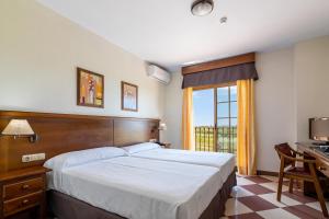 Postel nebo postele na pokoji v ubytování Hotel Avenida Tropical by Bossh! Hotels