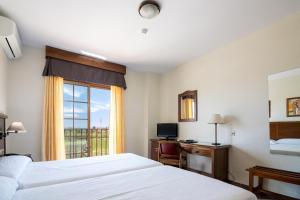 Postel nebo postele na pokoji v ubytování Hotel Avenida Tropical by Bossh! Hotels