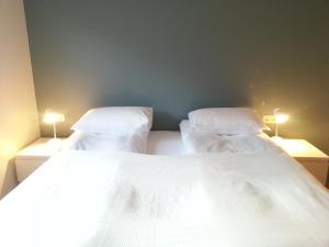 Seydisfjördur Guesthouseにあるベッド