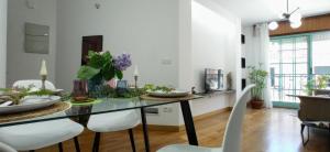 Televisyen dan/atau pusat hiburan di Apartamento en Moaña