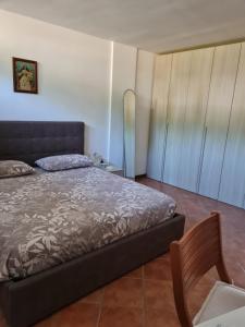 Ένα ή περισσότερα κρεβάτια σε δωμάτιο στο Come A Casa Tua