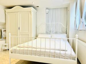 Łóżko lub łóżka w pokoju w obiekcie Studio am Waldbach